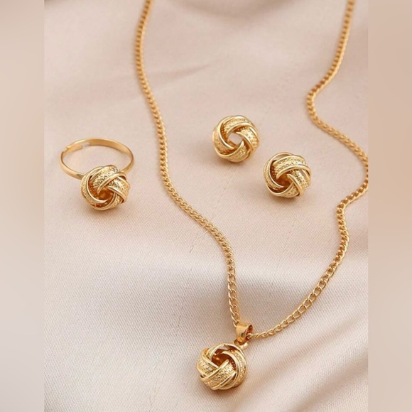 Jewelry - Jewelry 3 set necklace, stud earrings, and a ring size 8 gold plated knot design